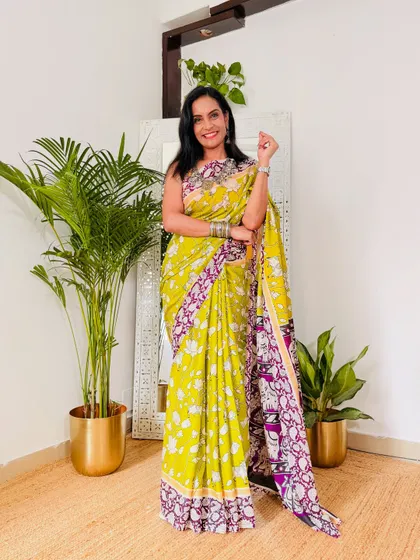 This lime green Kalamkari saree is so fresh and unique. The purple border adds a beautiful contrast. It's a comfortable and stylish option for a summer day.