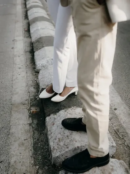 A detail shot focusing on their shoes and stance. It’s a simple, creative way to add variety to the photo album.