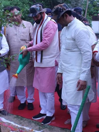Haryana Environment Minister Shri Rao Narbir Singh and other officials water newly planted saplings during the #EkPedMaaKeNaam campaign event.