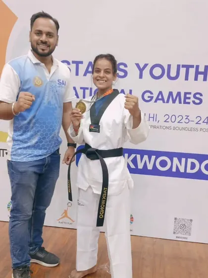A proud moment with one of our gold medalists at the Stairs Youth National Games. Our coaching focuses on building the mental and physical strength needed for top-tier competitions.