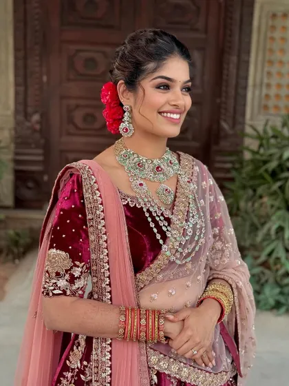 A joyful candid of the bride. Her glowing skin and bright smile are the highlights of this modern and magical Sangeet look.