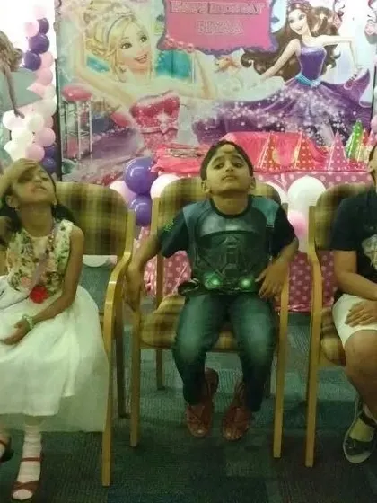 The concentration is real. This is a fun and silly game where kids have to try and get a biscuit from their forehead into their mouth without using their hands. It always results in a lot of giggles.