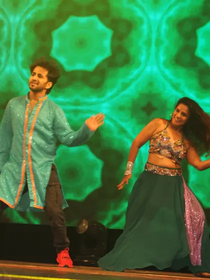 In the zone during a duet performance. The connection with a dance partner and the audience is an electric feeling that I teach my students to harness.