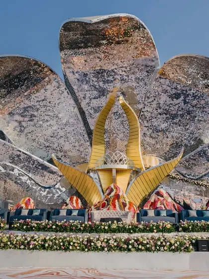 A closer look at the lotus stage, a marvel of design and engineering. This structure was the centerpiece of a grand reception, reflecting light and creating a magical effect.
