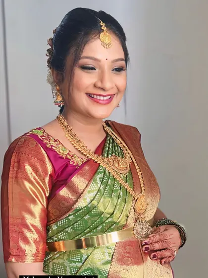 The gorgeous Manjula glowing for her baby shower function. Her smile says it all.