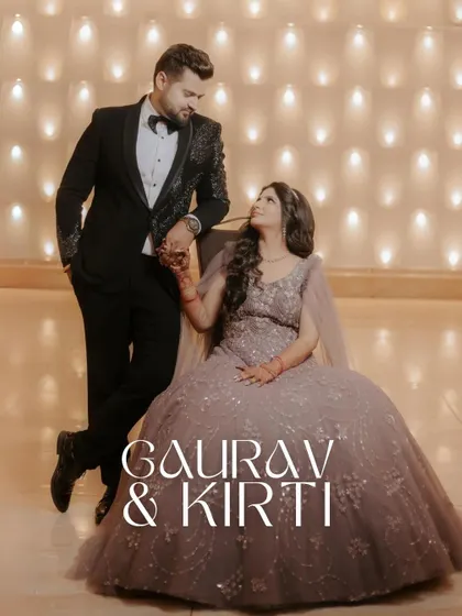 A regal portrait of Gaurav and Kirti. She is seated, exuding grace, while he stands beside her, creating a classic and powerful composition that highlights their bond.