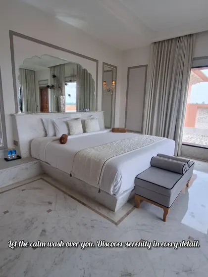 The serene and elegant bedroom at Buena Vista Resort. I focus on details like the plush bedding and classic decor to convey the comfort and luxury of the stay.