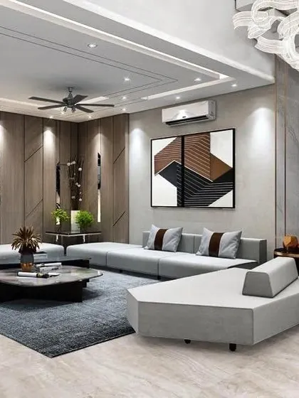 This living room design uses geometric wood paneling and a large, abstract art piece to create a modern and dynamic space. The low-profile, modular sofa enhances the contemporary feel.