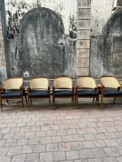 The five chairs are shown from the front, ready for a restaurant or cafe setting.