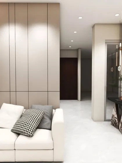 This render shows a serene living space with a white sofa, minimalist wall paneling, and a glimpse of a beautifully carved wooden cabinet, highlighting the blend of modern and traditional elements.