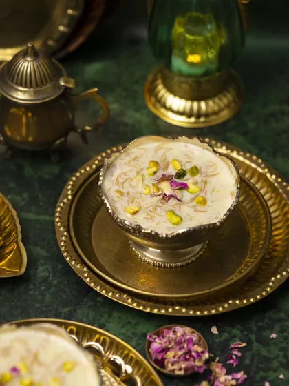 Eid is a celebration of sweetness and togetherness, and Sheer Kurma is at the heart of it. I styled this shot to feel rich, traditional, and full of warmth. The brass and silver utensils, combined with the moody lighting, create a sense of timeless festive joy.