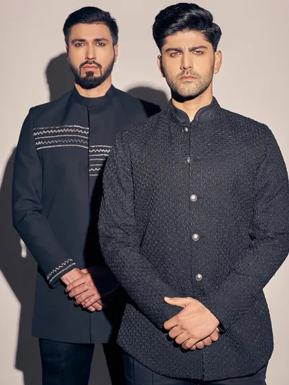 A closer look at the kohl-rimmed eye makeup for the male models. This demonstrates my ability to create bolder, editorial-style grooming looks when the concept requires it.