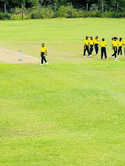 The team sets a field during their U-16 tournament match in Sri Lanka.