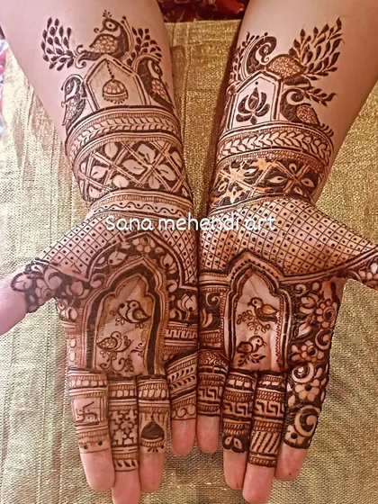 A Teej festival design with birds in a window and peacock motifs on the arms.