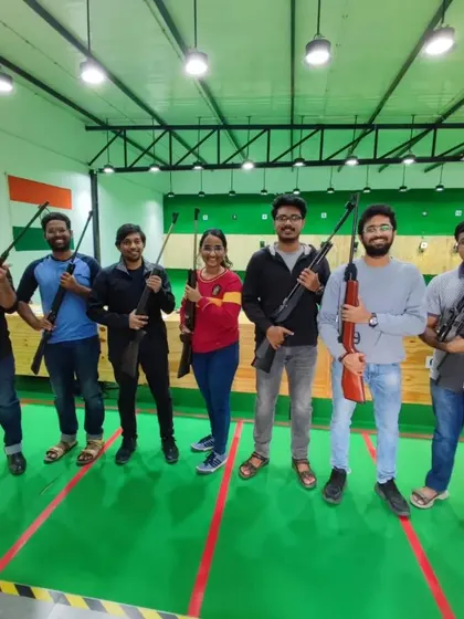 All smiles after a round of air rifle shooting. This is a perfect weekend activity to do with your friends, offering a mix of focus, fun, and friendly competition.