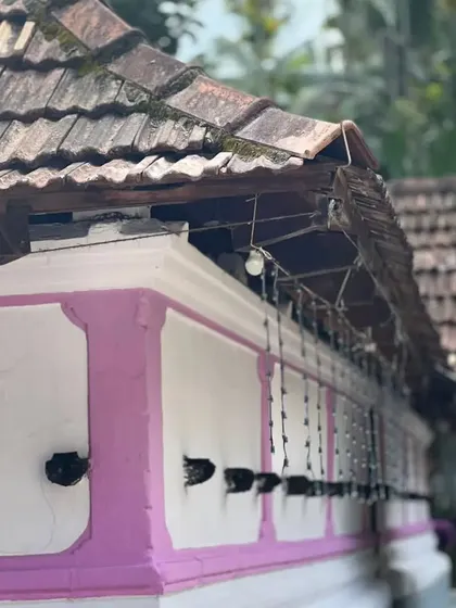 The traditional architecture of a Kerala temple, the perfect backdrop for our sacred dance offerings.