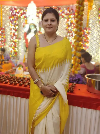 A full view of my Kali Pooja outfit. The saree's temple border design adds a subtle traditional touch to the modern color palette.