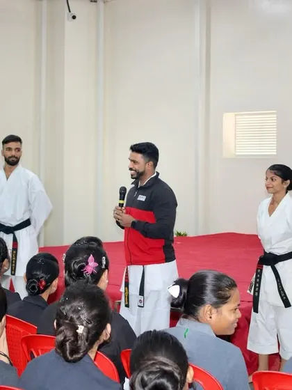 Our instructors on stage during a presentation for an International Women's Day event, demonstrating our commitment to women's empowerment.