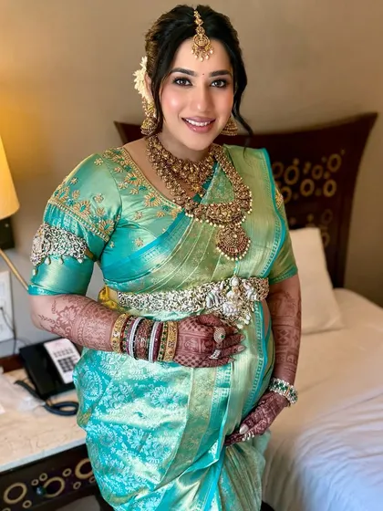 Another beautiful shot of this soon-to-be mom. The makeup is consistent and radiant from every angle, ensuring she looks perfect in all her photos.