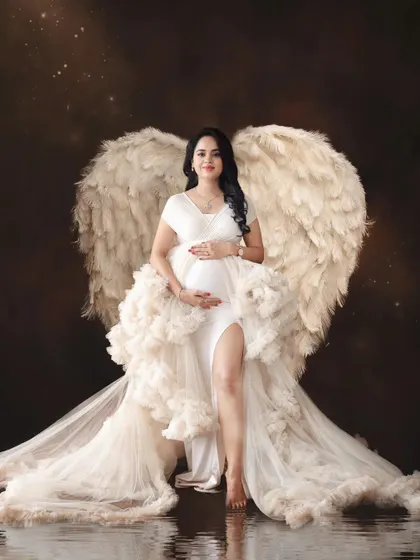 Motherhood gives you wings you never knew you had. This is for the mothers who are creating life, a true angel on earth. A dramatic and powerful portrait from a studio maternity session.