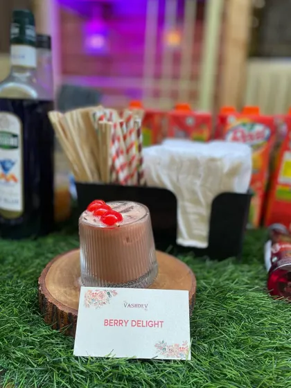 The Berry Delight is a creamy, fruit-filled mocktail that's both a drink and a dessert. It's a rich and satisfying option for guests with a sweet tooth.