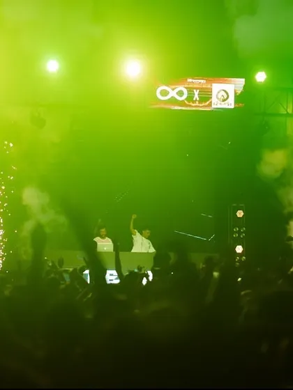 The stage at IIT Patna lit up in vibrant green during my set.