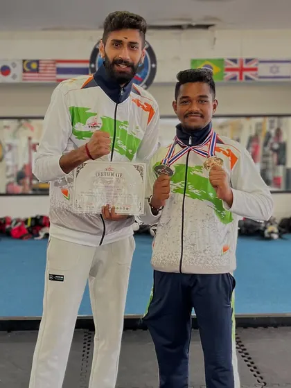 Posing with my student and his silver medal. Every competition is a learning experience that makes us stronger.