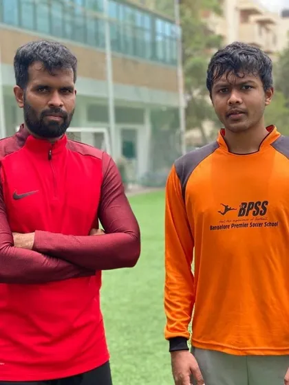 Standing with Vishnu, one of my most experienced players. His journey is a source of immense pride for me and the academy.