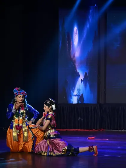 The expressive storytelling continues between Krishna and Gopika against a magical, moonlit backdrop.