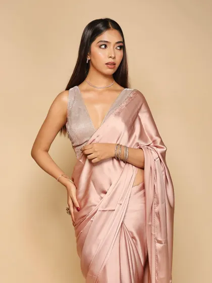 Another pose from the same saree shoot, highlighting the fabric's drape and texture. We ensure consistent lighting for catalogue and lookbook photography.
