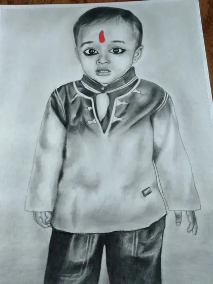 A commissioned portrait of a young boy in a traditional kurta, with the red bindi providing a striking pop of color.