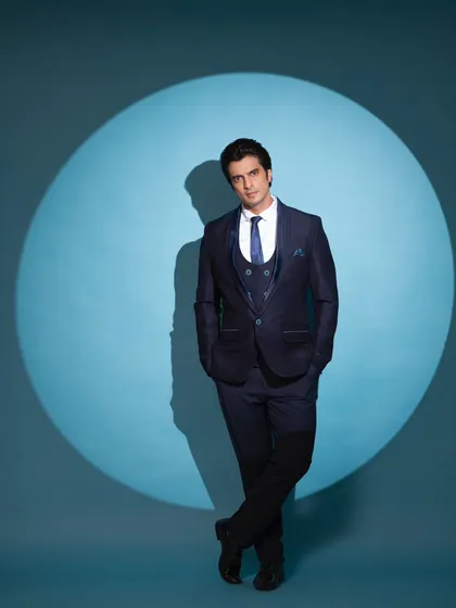 I styled the charming Gashmeer Mahajani for a commercial shoot in this sharp, three-piece navy suit. The focus was on a clean, modern, and powerful silhouette that exudes confidence and class.
