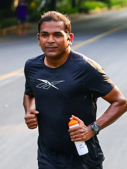 An athlete staying hydrated during a tough interval session. Smart training includes proper hydration strategy.