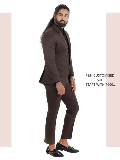 A side view of the brown suit, showing its clean, tailored lines.