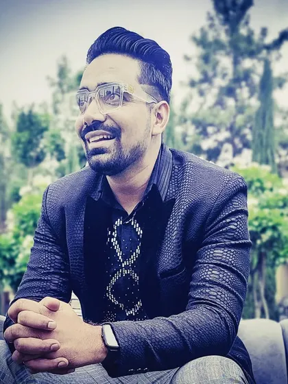 The quiet moment before the storm. Posing for a quick picture at Kumbhalgarh Fort just before the sangeet hungama began. A destination wedding host needs to be ready for anything.