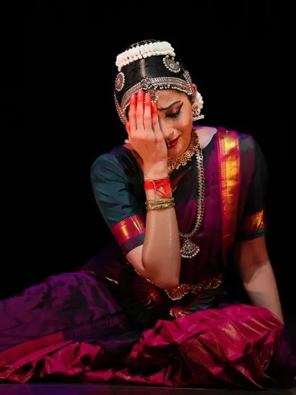 A moment of deep sorrow and despair, as the Nayika covers her face in anguish. This showcases the depth of emotion that can be conveyed through abhinaya.