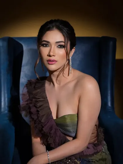 Styling actress Ridhima Pandit for Anjum Qureshi Label. The dual-toned, draped gown with a thigh-high slit is both elegant and glamorous, perfect for a red carpet or cocktail event.