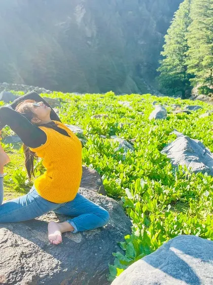 Performing Eka Pada Rajakapotasana (One-Legged King Pigeon Pose) on a rock. When you listen to yourself, everything comes naturally. This is yoga.