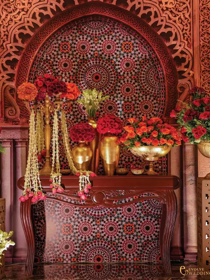 A full view of the ornate console table with its mosaic arch backdrop and lavish floral arrangements. This single vignette encapsulates the entire 'Pakeezah Sufi' theme of spiritual and aesthetic abundance.