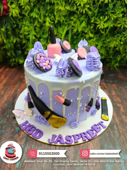 A fun makeup cake for Jaspreet's birthday. The purple drip design is topped with edible makeup items like eyeliner, lipstick, and eyeshadow.
