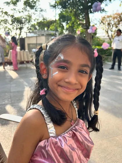 A happy smile and a dash of glitter. Even a simple design can bring so much joy to a child's day.