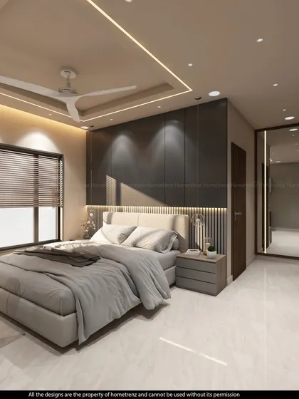 A well-lit bedroom with a large window and a mirrored wardrobe. The combination of a dark accent wall and light-colored flooring creates a balanced and modern look.