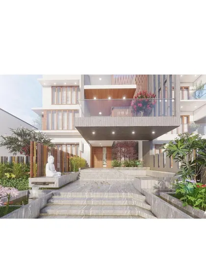 A detailed view of the entrance for a modern residence. The design features a grand staircase, integrated landscaping with a Buddha sculpture for tranquility, and a cantilevered porch that creates a welcoming entry point.