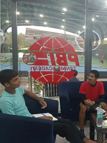 Players discuss strategies and mental approaches in a relaxed, collaborative setting in our academy lounge.