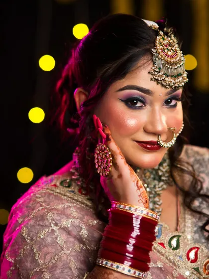The rich colors of the makeup pop against the soft lighting. Our students learn about lighting to ensure their makeup looks great in any setting.