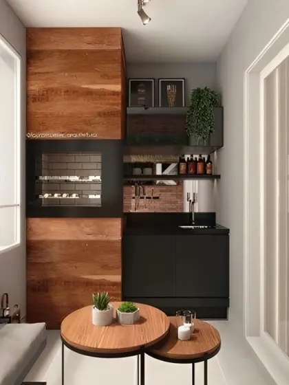 A contemporary design combining wood and matte black finishes. This unit includes an integrated grill or oven, a small sink, and open shelving, turning the balcony into a compact outdoor kitchen and bar.