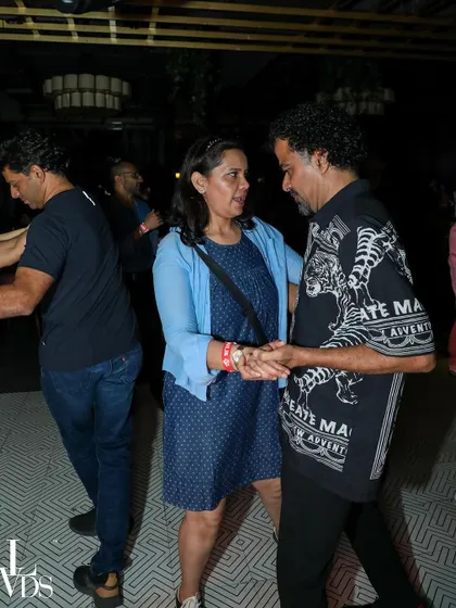 A couple enjoying a quiet dance together, showing the relaxed and comfortable atmosphere of our studio socials.