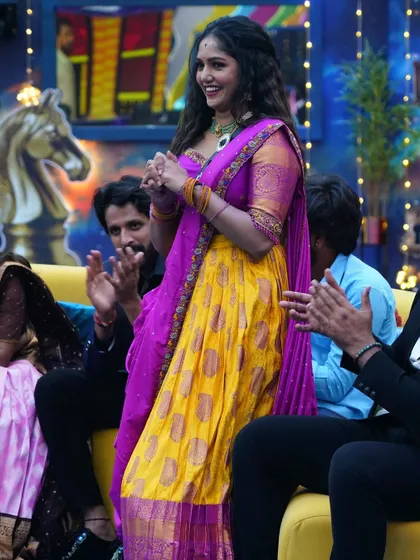 Another shot of Bhavya looking cheerful and vibrant in her custom-designed traditional wear.