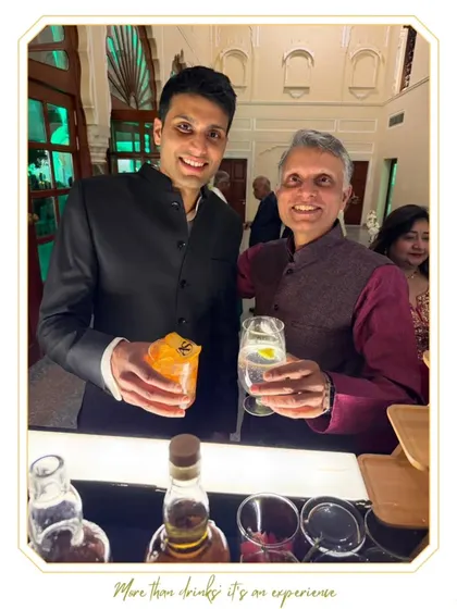 Two guests enjoying different cocktails, one classic and one modern. Our diverse menus ensure there's a perfect drink for every taste.