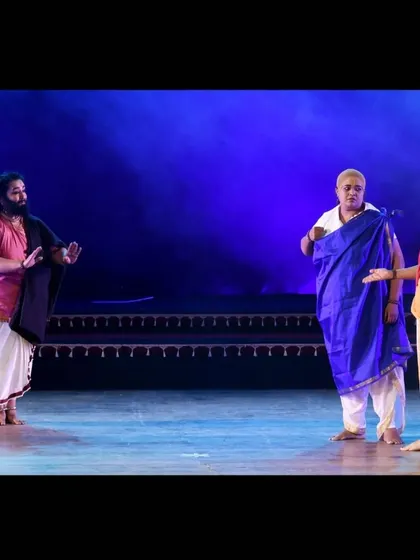 A theatrical moment on stage, where dialogue and expression are as crucial as the dance itself.